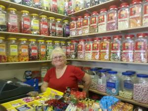 Sandra the sweet lady from Candy Stripes sweet shop.